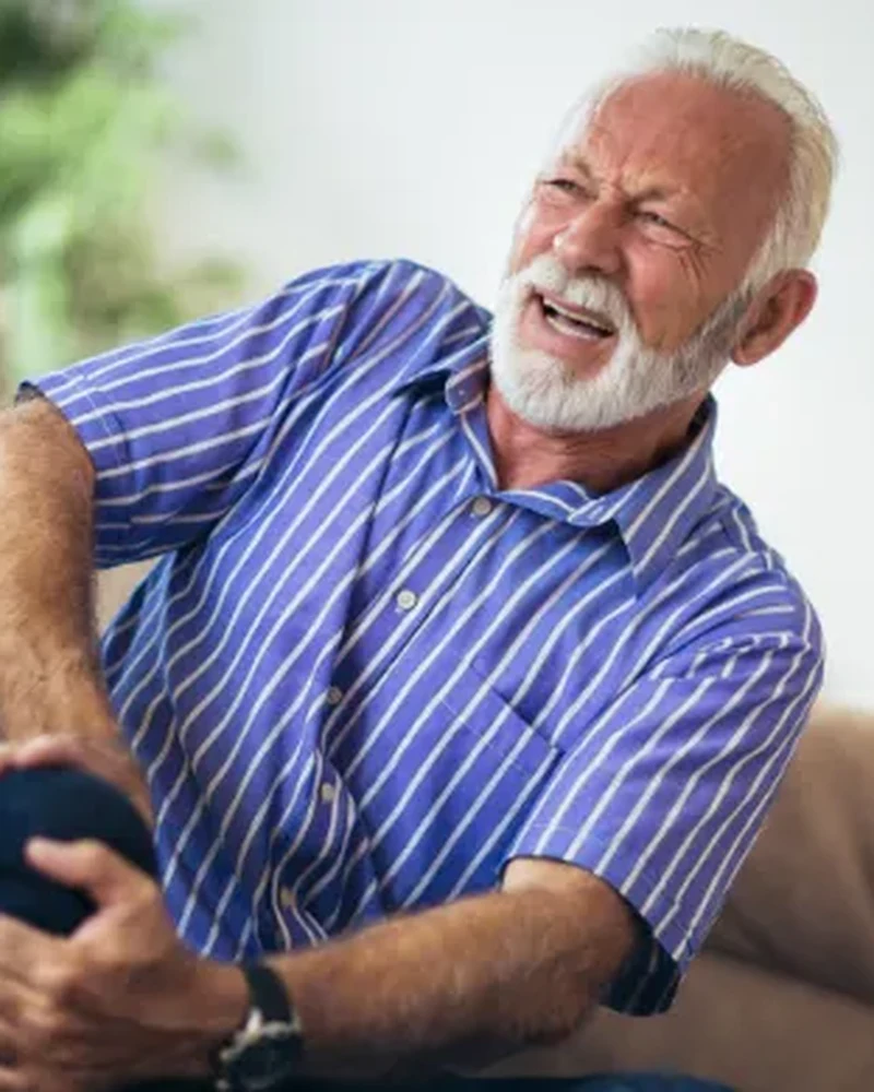 Therapist working with a patient on chronic pain management exercises