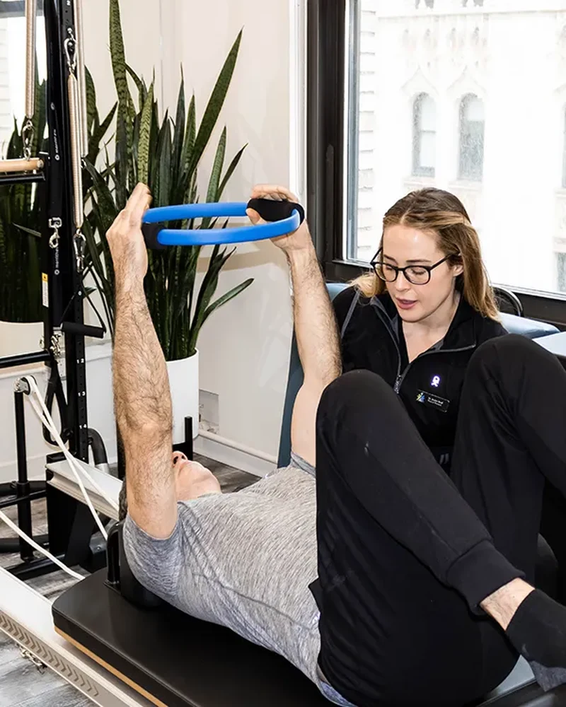 Therapist working with a patient on wrist and hand rehabilitation