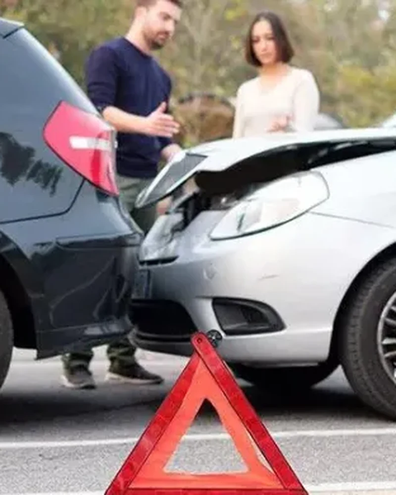 Therapist treating a patient's neck and back after a car accident