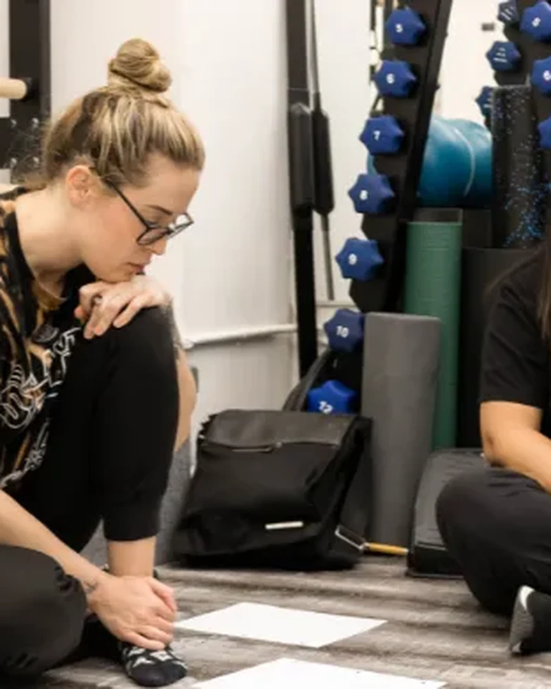 Physical therapist leading a Clinical Pilates provider training session