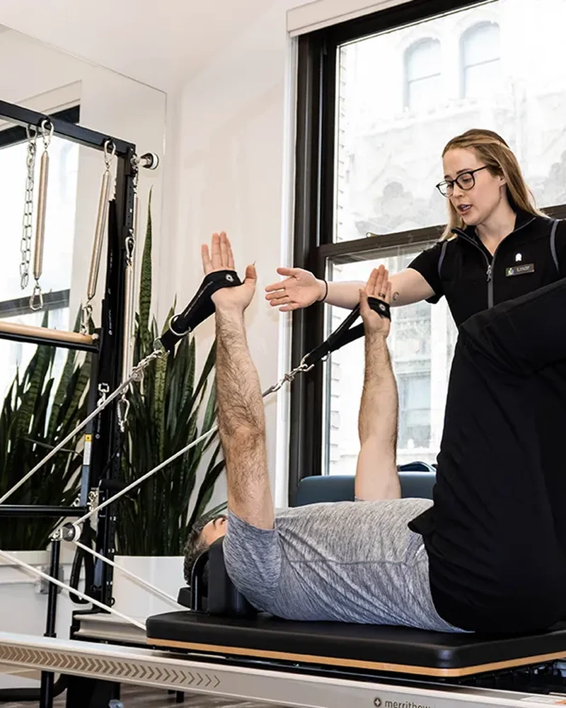Physical therapist working one on one with a patient