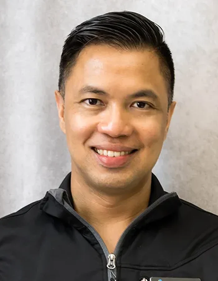 Dr. Kristian Marcial outside the clinic