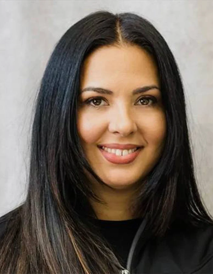 Dr. Monica Saliu outside the clinic